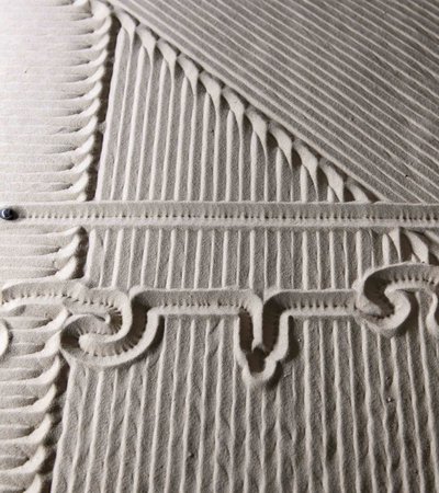 Arabic script written in sand.