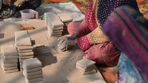 women hand working with clay