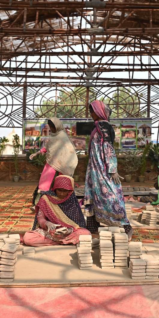 women working with clay