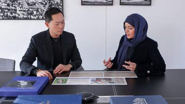 Man and a woman discussing a jewellery design