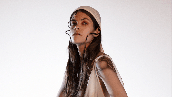 Model wearing a white dress