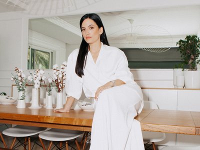 Woman sitting on a table