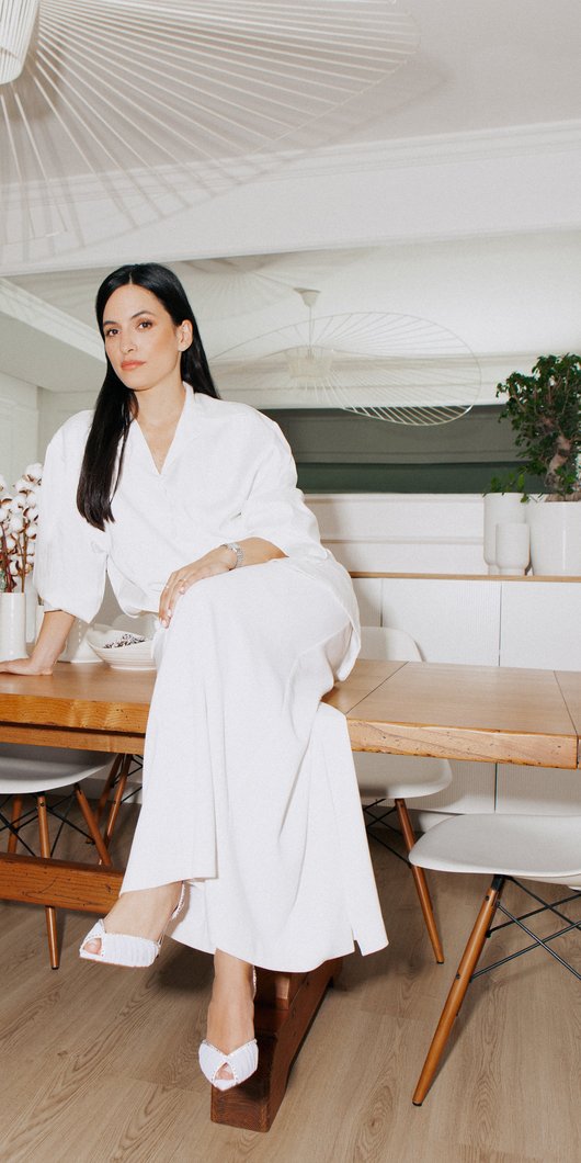 Woman sitting on a table