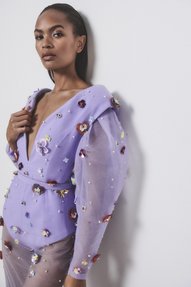 Woman in a purple dress