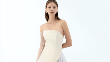 woman in a beige dress