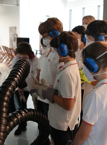 Children using machinery