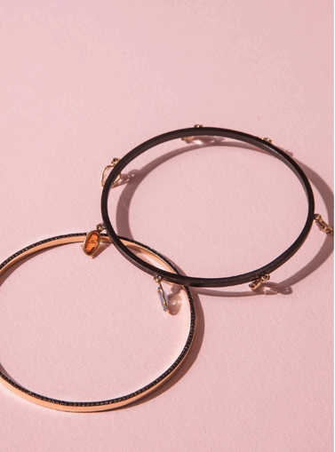 Jewellery displayed pink background