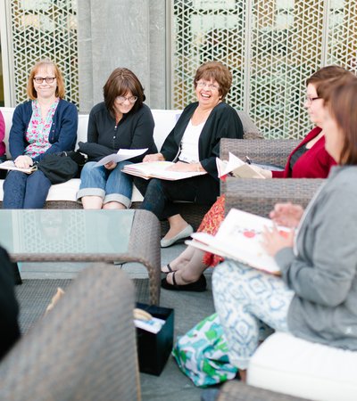 A group of women meeting outdoors at MIA