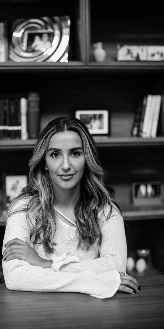 woman sitting on a desk
