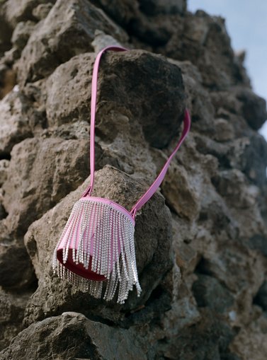 bag hanged on a rock