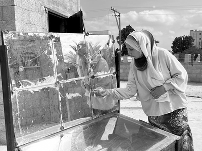 women looking into glass
