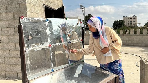 lady in front of glass