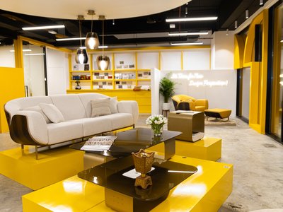 Yellow office space with furniture display