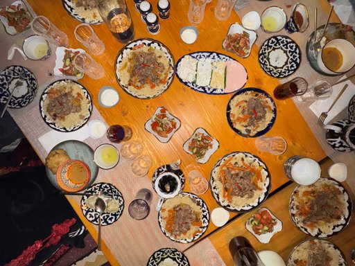 birds eye view of a table with lots of food spread across it
