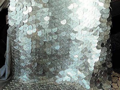 coin dress being made