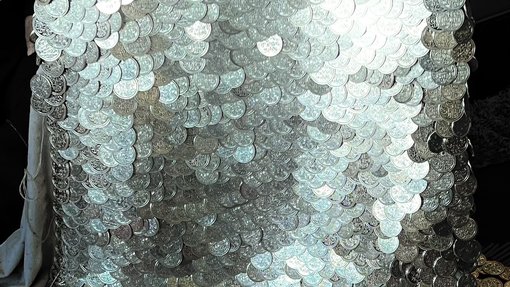 coin dress being made