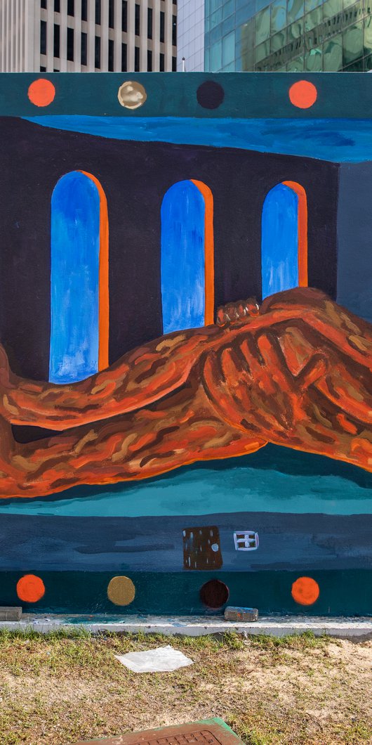 Artist Abdulla Al-Emadi’s brightly colored mural titled Limbo placed at Al-Abraj Park.