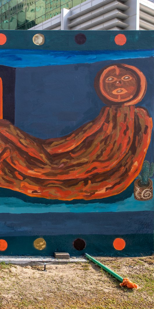 Artist Abdulla Al-Emadi’s  brightly colored mural titled Limbo placed at Al-Abaj Park