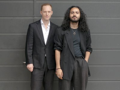 Two man posing in front of the camera