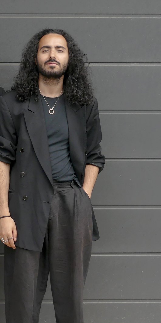 Two man posing in front of the camera