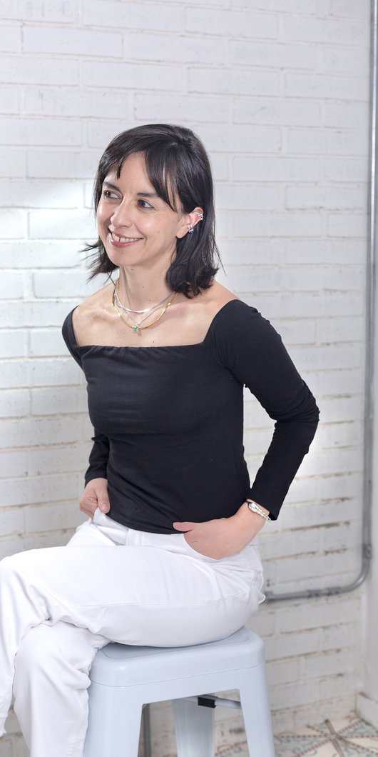 Woman sitting and looking away