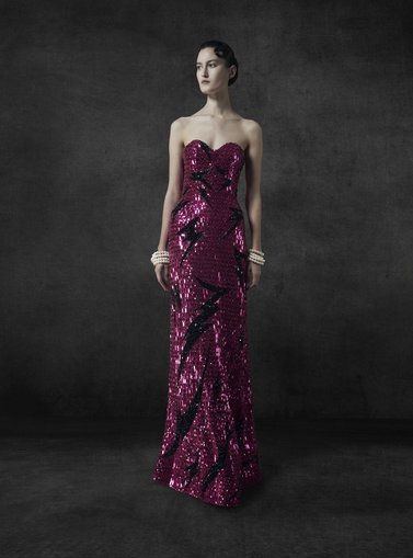 Model posing in a long evening dress