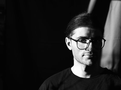 Black and white image of man with glasses