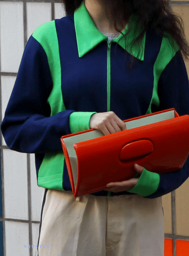 Close up of a shirt and a bag