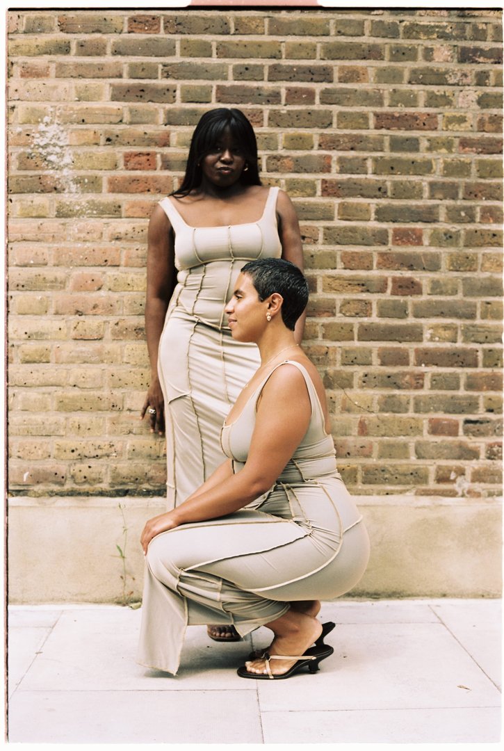 Woman posing for the camera with long dress