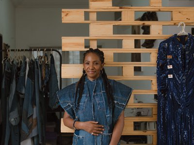 Woman in front of wall with patterns