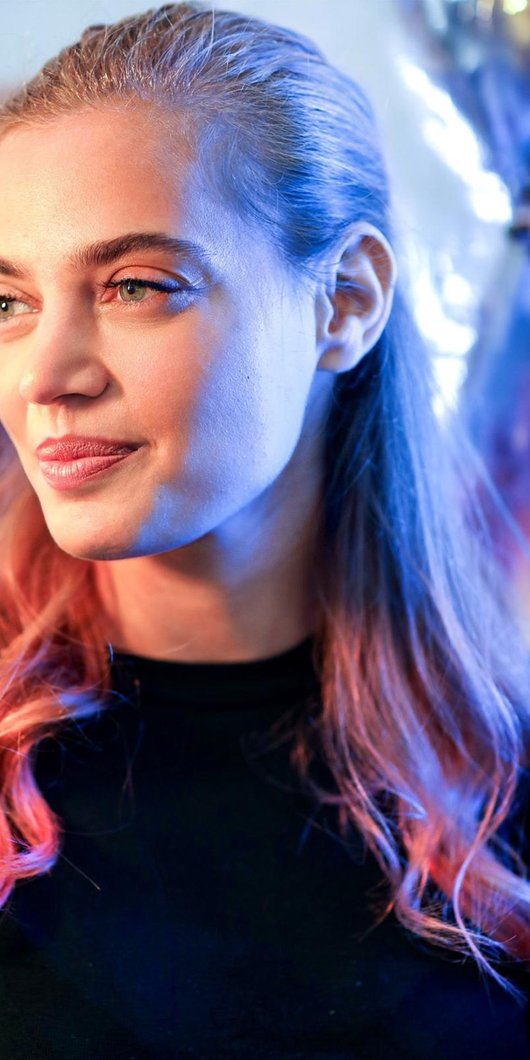 Woman smiling to the side