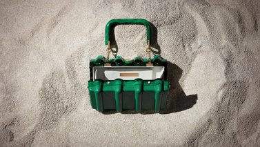 Small green bag displayed