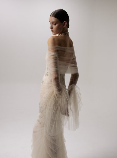 Model in a long white dress