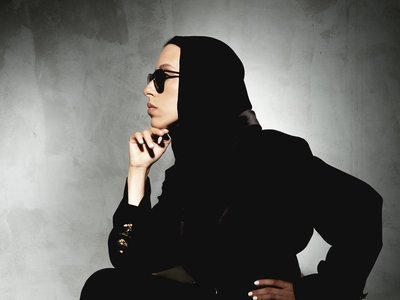 Woman posing sideways