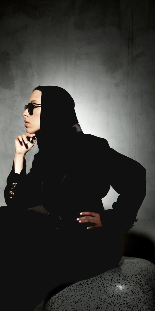 Woman posing sideways