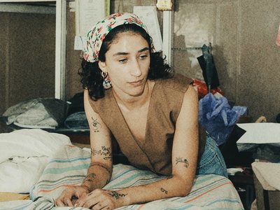 girl standing in a window