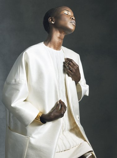 Model wearing a short white dress