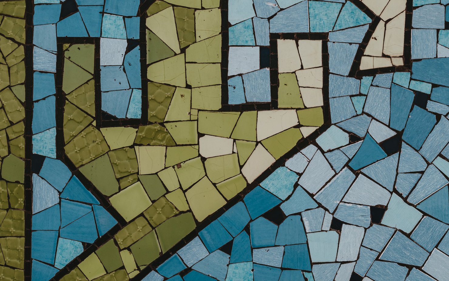 A close up of mosaic tiles