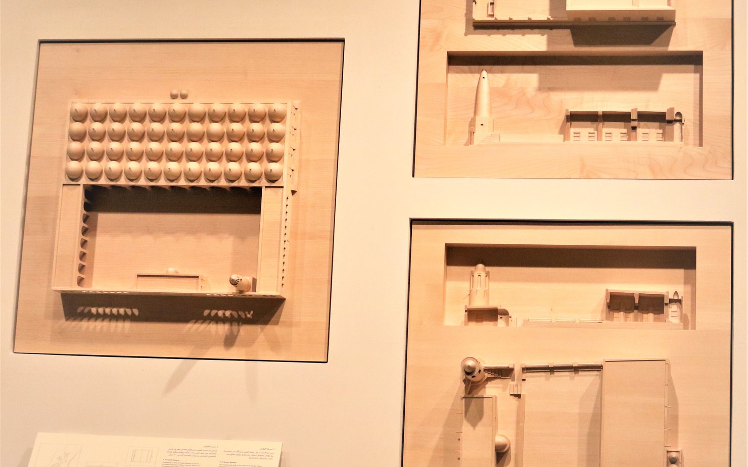 Three plates showing an aerial view of old architectural blueprints of a palace