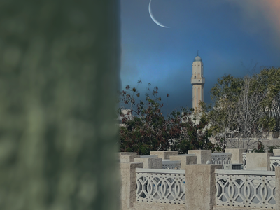 image of a mosque in the background with a night sky and moon