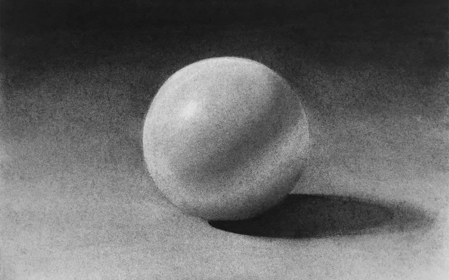 Gray ball on a black and white background