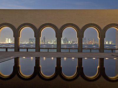 A wide-angle view of the MIA courtyard overlooking the Doha skyline