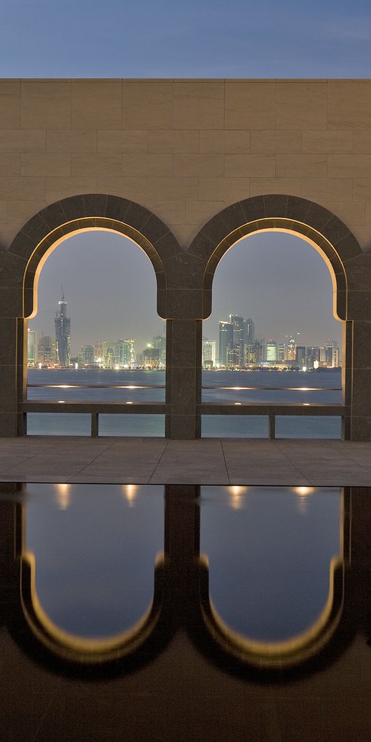 A wide-angle view of the MIA courtyard overlooking the Doha skyline
