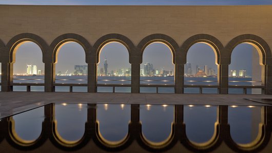 A wide-angle view of the MIA courtyard overlooking the Doha skyline
