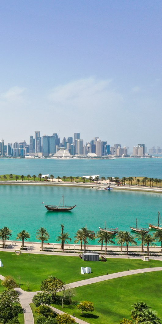 A view of the Museum of Islamic Art with the iconic Doha skyline and the corniche right behind it