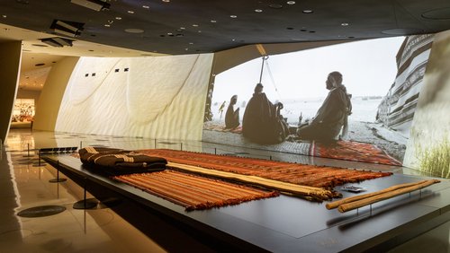 Gallery space at the National Museum of Qatar showcasing traditional objects used at the desert