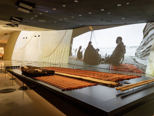 Gallery space at the National Museum of Qatar showcasing traditional objects used at the desert