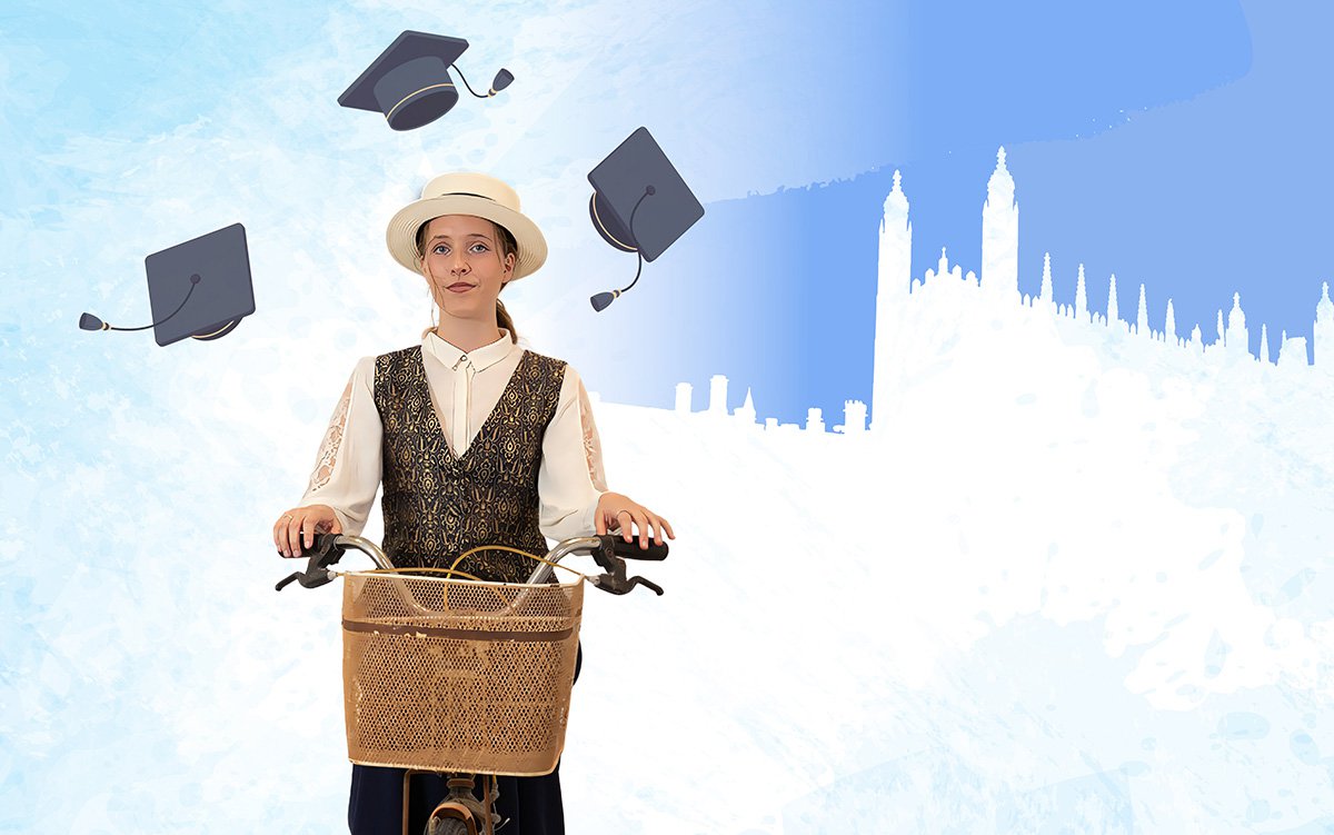 A young lady rides a bicycle against a pale blue background